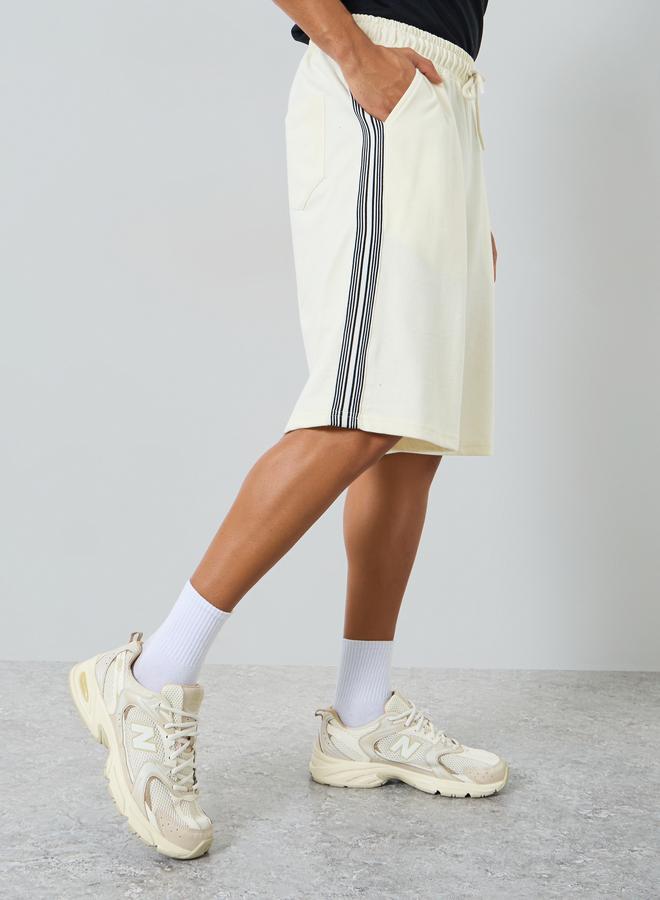 Styli Men Off-White Striped Terry Oversized Shorts - Image 4